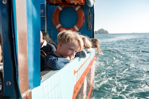 A little boy on the boat over to Elizabeth Castle