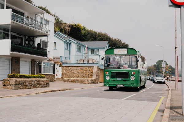 Jersey BUs and Boat Tours open top bus on the coast road