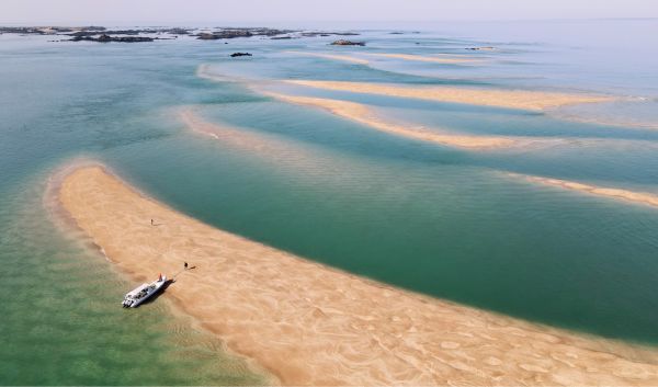 A rib moored at the Ecrehous Sand Bar