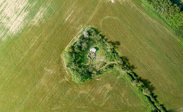 Faldouet dolmen aerial view surrounded by green field