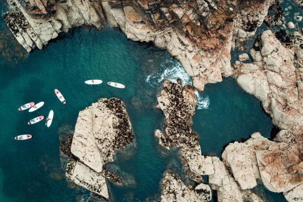 Paddleboarders at Greve de lecq