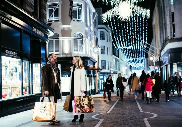 Couple on the high street at Christmas