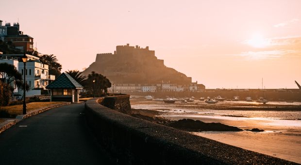 Historic castle at sunset on the beach