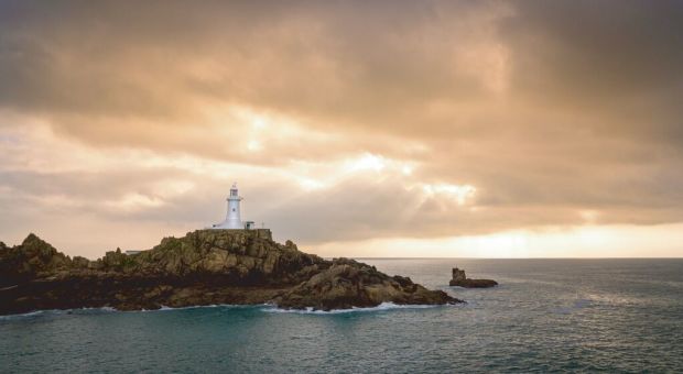 Moody shot of La Corbiere Lighthouse in Jersey, Channel Islands