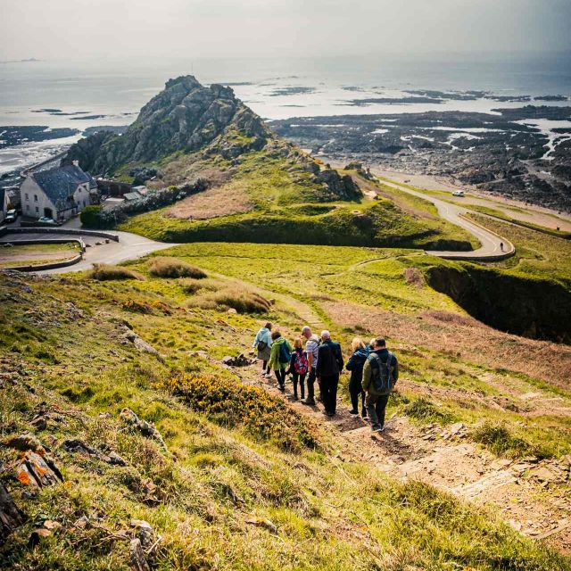 Walkers exploring the headland at L