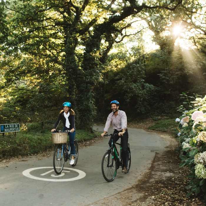 A couple cycling in Jersey's green lanes