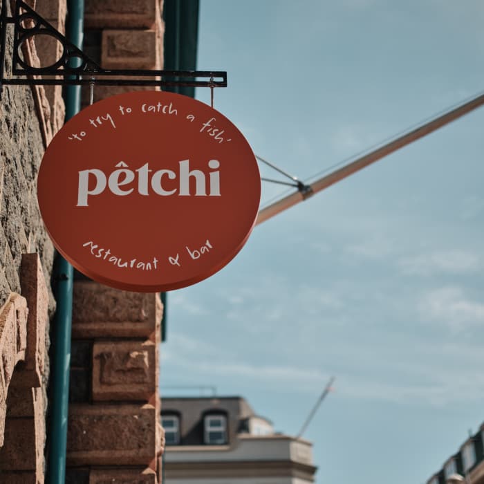 Restaurant signage with blue sky